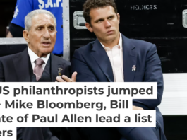 Home Depot co-founder Arthur Blank, one of the top 50 donors of 2025, talks with his son Josh Blank. Kara Durrette/Getty Images